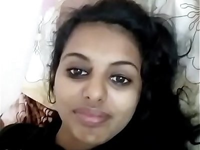Indian teen beauty lifts up her shirt exposing those perky tits